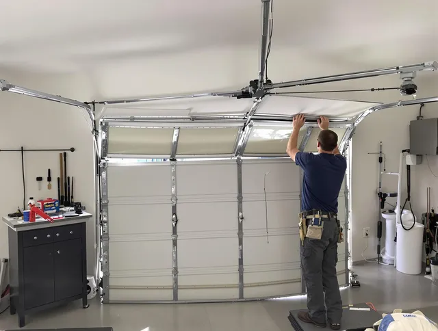 Rowland Heights Garage Door Repair specialist performing precise section replacement on Rowland Heights garage door